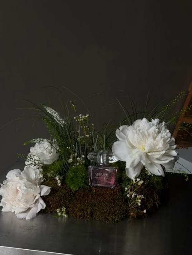 Editorial floral styling for a luxury fashion brand content shoot
